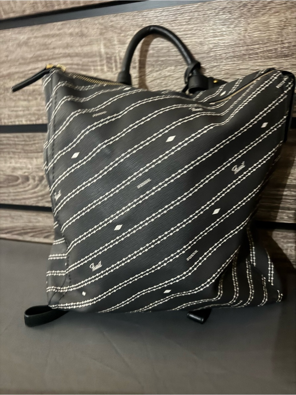 Fossil Black Patterned Zip-Top Backpack